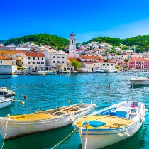 Boats in water at Pucisca Brac